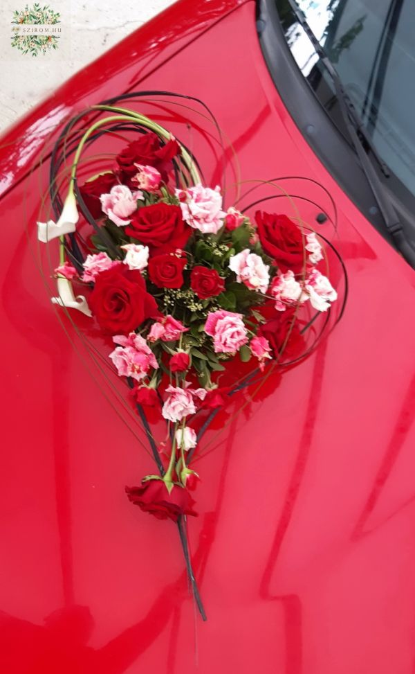 Heart shaped modern car decor with red roses, callas, lisianthusses