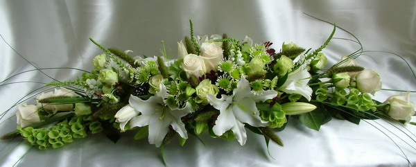 flower delivery Budapest - long arrangement of white - green flowers