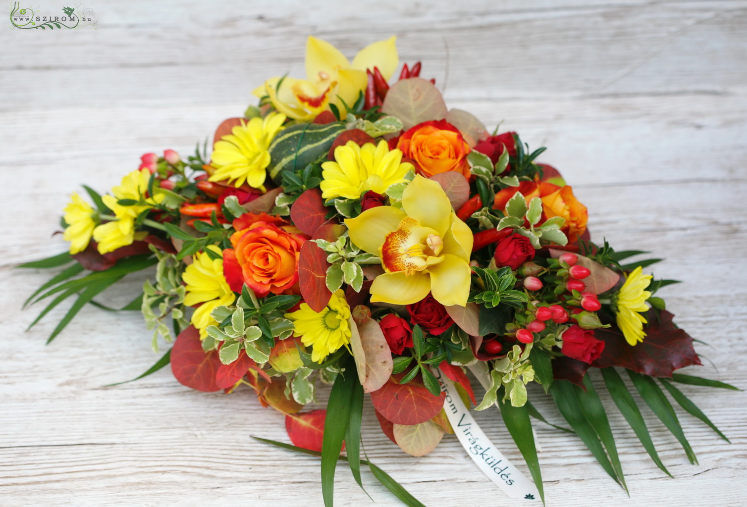 flower delivery Budapest - Main table centerpiece with passion flowers (orchid, rose, bushy rose, hypericum, chrysanthemum, yellow, orange), wedding