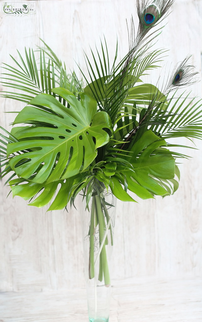 flower delivery Budapest - Botanical enterpiece in vase with palm leafs, monstera leafs and peacock feathers