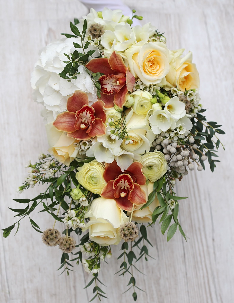 flower delivery Budapest - Teardrop bridal bouquet (creme rose, buttercup, orange orchid, white freesia, hydrangea, scabiosa, brunnia, wax)