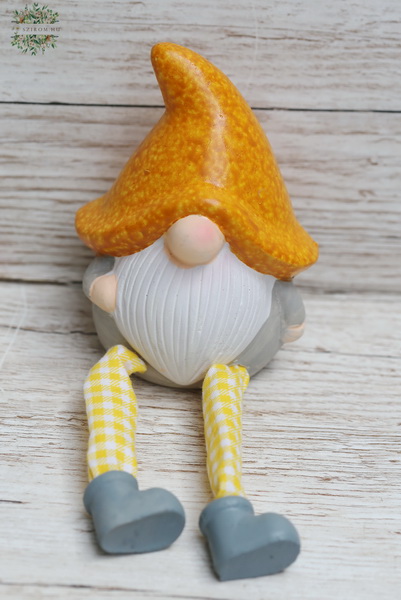 flower delivery Budapest - Yellow ceramic leprechaun with hanging legs 19 cm 