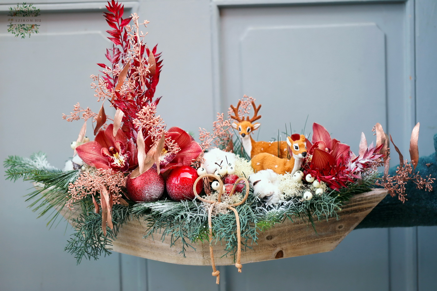 flower delivery Budapest - winter landscape with deer in a wooden boat