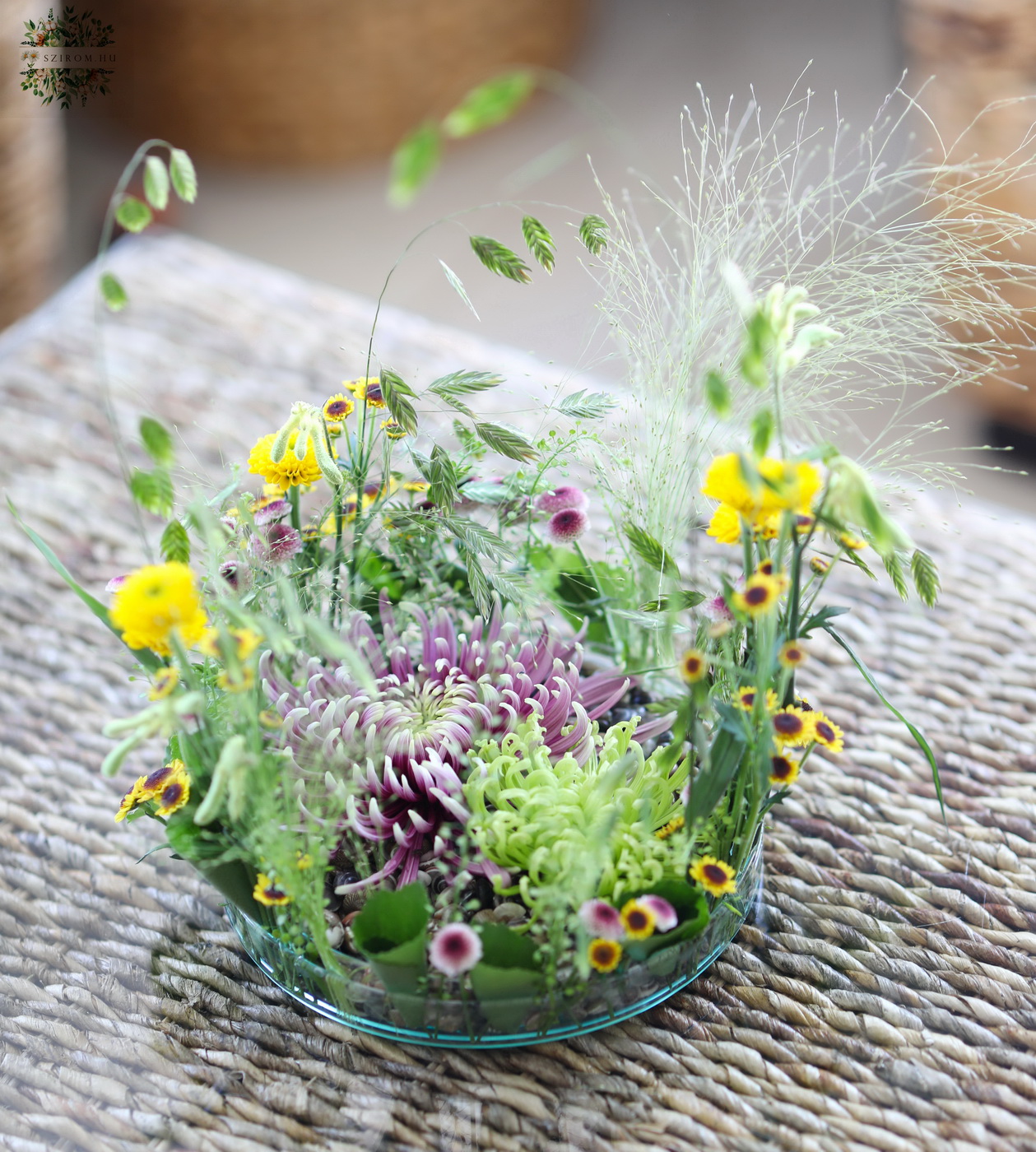 flower delivery Budapest - Glass bowl with airy meadow style decoration, pebbles (20cm, purple, yellow, chrysantem, santini)