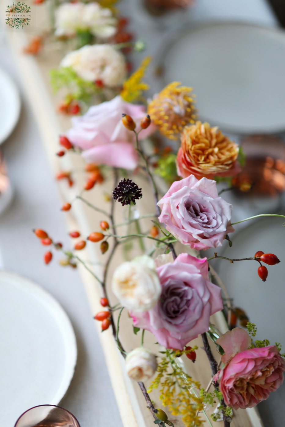 flower delivery Budapest - Modern wedding event centerpiece on wooden table (rosehip, lavender purple, orange, pastel yellow, English rose, leucospermum)