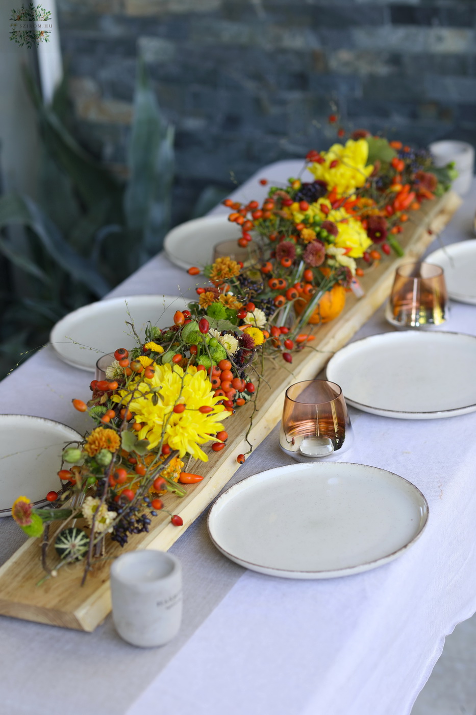 flower delivery Budapest - Modern wedding table decoration with vials and autumn flowers (chrysanthems, orange, yellow, burgundy)
