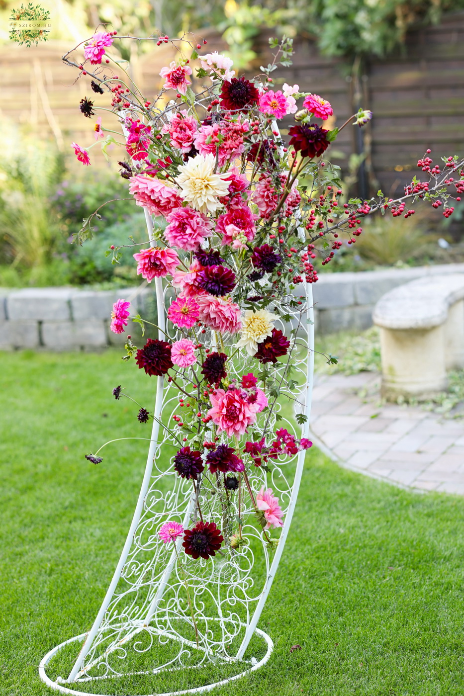 flower delivery Budapest - Asymmetrical wedding gate arch with dahlias, zinnias, seasonal berries (pink, burgundy, red)