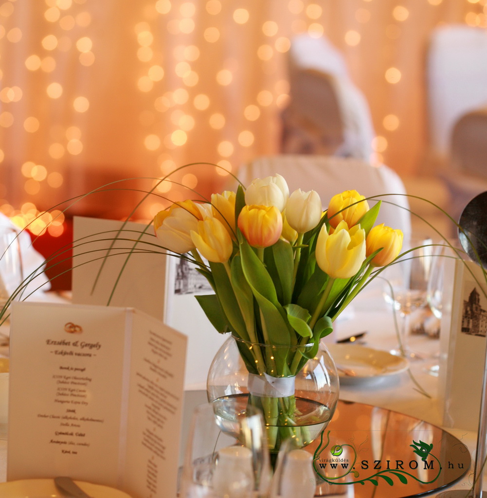 flower delivery Budapest - centerpiece of tulips in glass ball, Hilton Budapest, orange, wedding