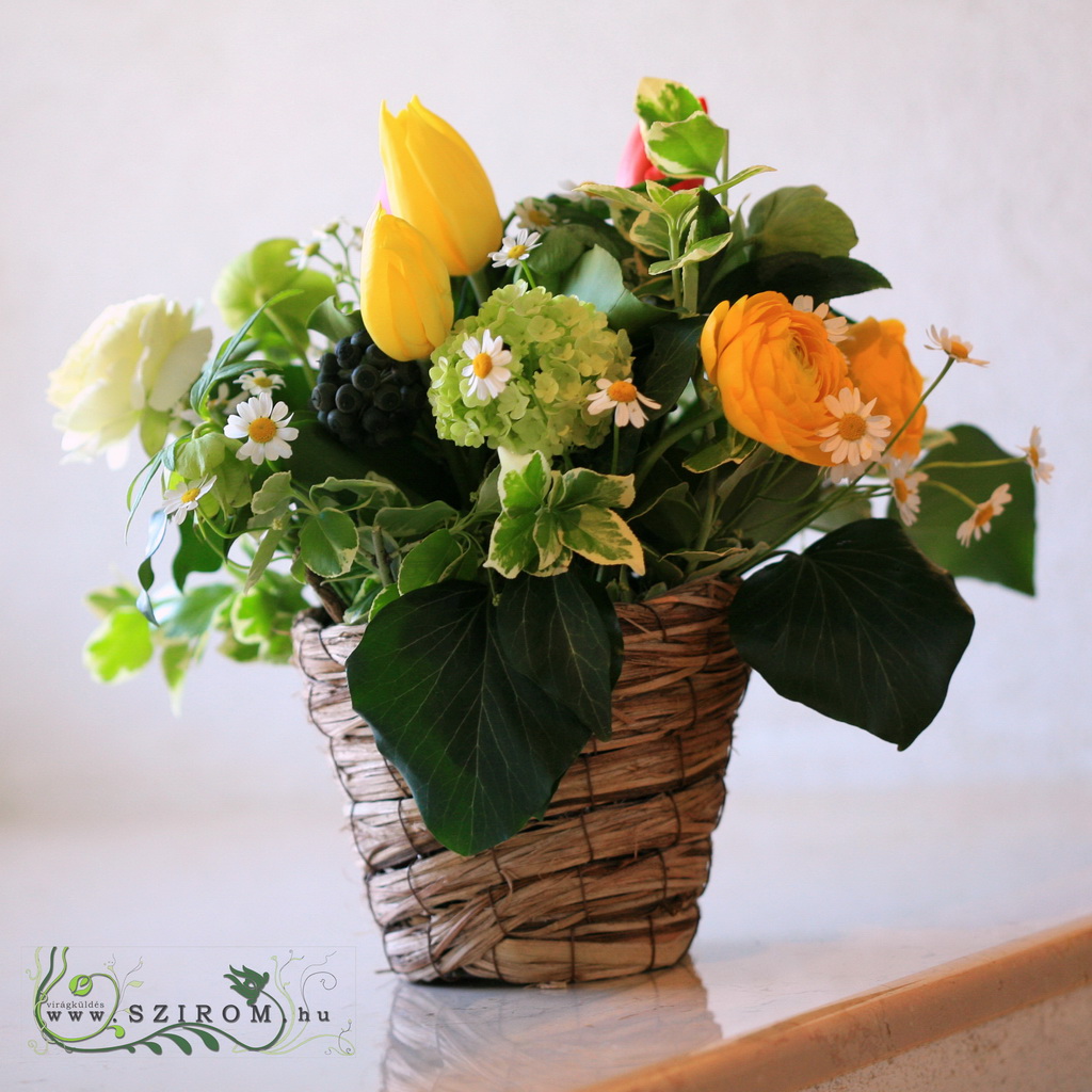 flower delivery Budapest - Wedding basket centerpiece of spring flowers (tulips, buttercups, chamomile, yellow)