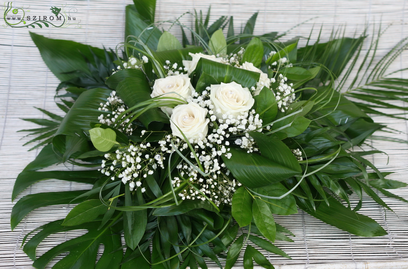 flower delivery Budapest - round car flower arrangement with lots of greenery (rose, gypsophila, white)