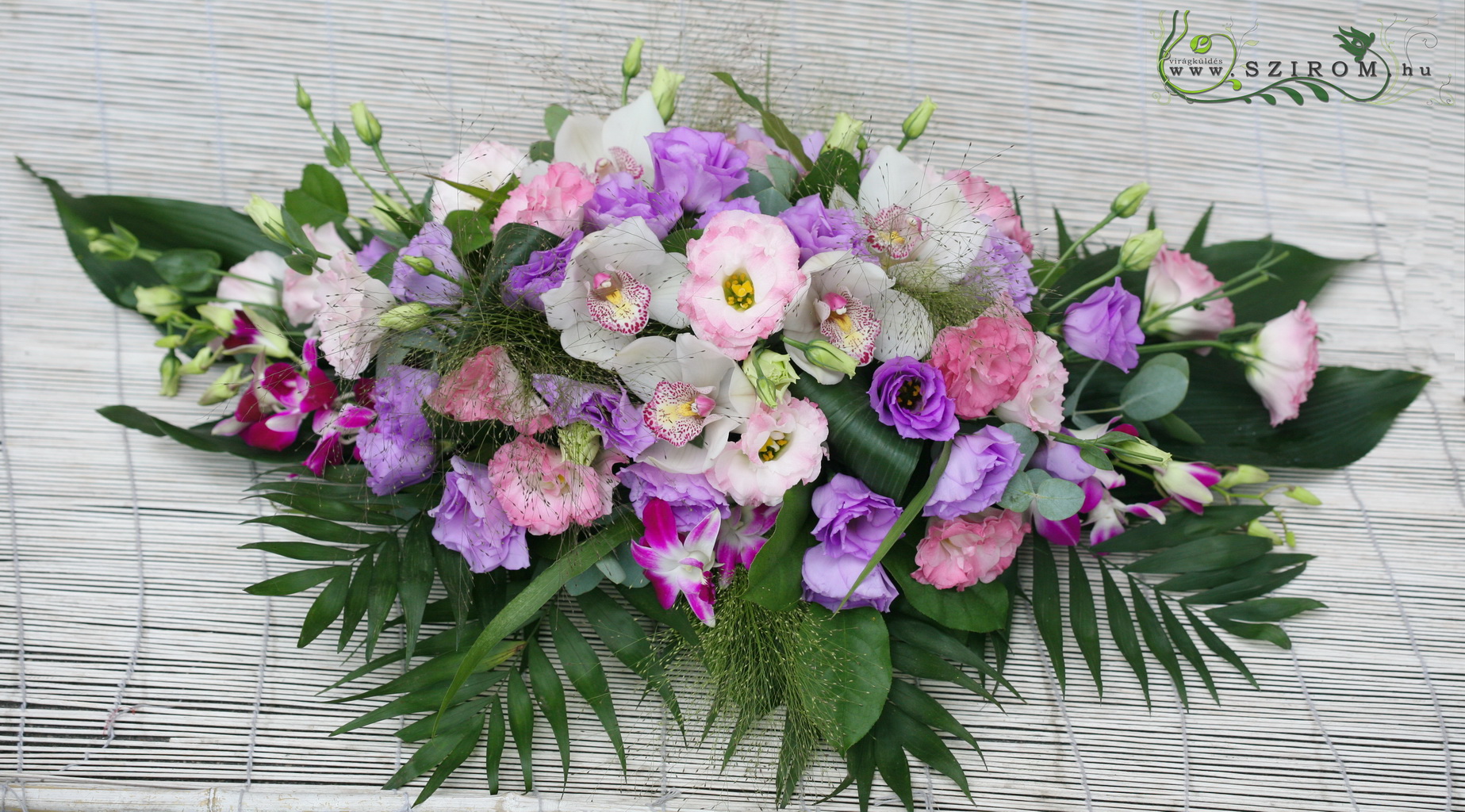 flower delivery Budapest - Corner car flower arrangement with lisianthus and orchids (purple, pink, white)